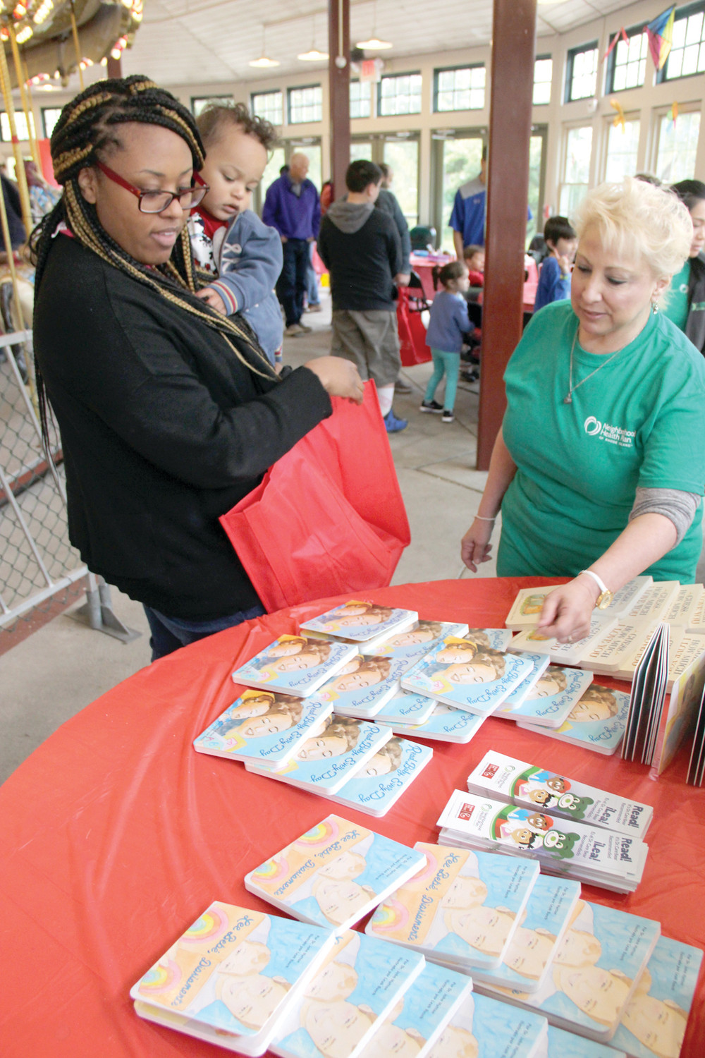 ALL ABOUT READING AND BOOKS: People were encouraged to take children’s books at the event as long as they would be reading them to children.
